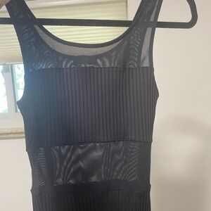 Bebe size XS mid-calf length dress with sheer cutouts